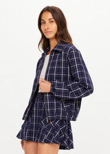 THE UPSIDE women's check Valencia Lexi Collared Jacket is relaxed fit with zip-through bomber style, collar, and front flap pockets with antique brass buttons. Made for lifestyle.