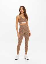 THE UPSIDE women's multi coloured spacedye Seamless 25inch Legging offers a supportive & comfortable fit and features white striped ribbed cuffs.  Made for yoga & pilates.