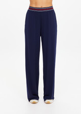 THE UPSIDE women's navy recycled polyester Harlan Wide-Leg Pant is designed for a true-to-size fit and features side-seam pockets and a striped elastic waistband. Made for lifestyle.