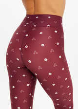 THE UPSIDE women's maroon recycled Bandhani 25-inch midi pant has a soft, supportive fit with elastic drawcord, cream aglets, and mid-rise. Made for yoga and Pilates.