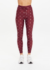 THE UPSIDE women's maroon recycled Bandhani 25-inch midi pant has a soft, supportive fit with elastic drawcord, cream aglets, and mid-rise. Made for yoga and Pilates.