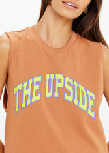 THE UPSIDE women's orange organic cotton Dawson Tank has a relaxed fit, mid length, and a printed lime varsity logo on the front chest. Made for lifestyle.
