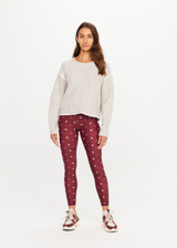 THE UPSIDE women's natural wool blend Xanthe Crew Neck Knit Sweater has a relaxed fit with cable knit and decorative blanket stitching. Made for lifestyle.