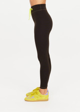 THE UPSIDE women's olive jacquard Castilla 25 Inch Midi Pant is designed for a soft and comfortable fit and features mid-rise with lime elastic drawcord. Made for yoga and pilates.