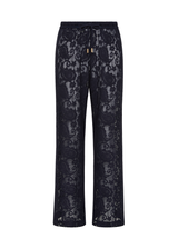 THE UPSIDE women's navy Halcyon Lace Charli Pant is designed for a low-rise straight leg fit with a fine drawcord through waist with elasticated back. Made for lifestyle.