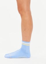 THE UPSIDE women's blue anti-slip Rever Grip Sock features stripes in cream and lemon and a soft terry sole with lemon star grippers. Made for yoga & pilates.