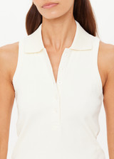 THE UPSIDE women's cream Courtship Henri Collared Top is made in moisture wicking, rib performance fabric and features a ribbed collar and buttons on front neckline. Made for tennis, gold & pickleball.