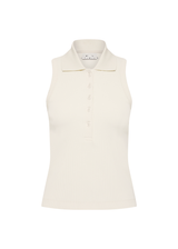 THE UPSIDE women's cream Courtship Henri Collared Top is made in moisture wicking, rib performance fabric and features a ribbed collar and buttons on front neckline. Made for tennis, gold & pickleball.