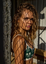 THE UPSIDE women's green Racquet Scoop Danni Bra features a contrast binded scoop neckline, adjustable straps and removable cups with a mini scallop trim at underbust. Made for tennis, golf & pickleball.