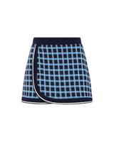THE UPSIDE women's navy and blue plaid cotton Clubhouse Reece Mini Skirt is designed as a faux wrap skirt featuring a soft elastic waistband and a curved hemline. Made for tennis, golf & pickleball.