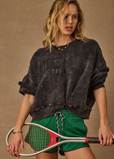 THE UPSIDE women's washed black Cosmic Paloma Crew is an oversized fit with a drop shoulder crafted from heavy organic cotton brushed fleece. Made for everyday.