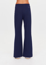 THE UPSIDE women's navy Toledo Petra Flare Pant features tan knitted tape down sides, an elasticated waistband, side pockets and splits at hem. Made for everyday wear.