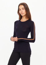 THE UPSIDE women's black Merino Wool Long Sleeve Top is designed for a slim fit and features a crew neck with mocha stripe down sleeve. Made for lifestyle.