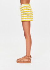 THE UPSIDE women's yellow organic cotton Goldie Malik Crochet Short is designed for a regular fit and features a hand crocheted flower design & an elasticated waist with tassel drawcord.