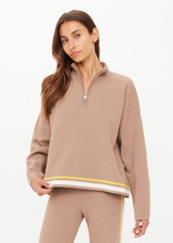 THE UPSIDE women's mocha Veneto Carter Knit Zip Top fits true-to-size and features a half zip and arrow logo on sleeve hem. Made for lifestyle.