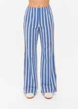 THE UPSIDE women's blue stripe Palmas Marnie Wide Leg Pant offers a high-rise, wide leg fit and features an elasticated waistband and side pockets. Made for lifestyle.