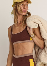THE UPSIDE women's brown Montage Rory Scoop Knit Sports Bra features a scooped neckline with mid coverage and yellow side pannels. Made for yoga & pilates.