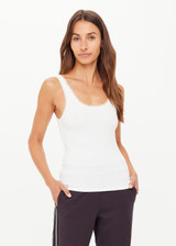 THE UPSIDE women's cream organic cotton Del Rey Pointelle Tank Top features a scooped lace trim neckline with a soft ribbed fabrication. Made for everyday wear.