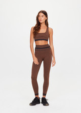 THE UPSIDE women's brown seamless Marle Seamless Jade Sports Bra offers full coverage with a scooped back, black stripe at underbust and removeable cups. Made for yoga & pilates.