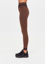 THE UPSIDE women's brown seamless Marle Seamless 25Inch Midi Legging offers a mid-rise with a black stripe at waistband. Made for yoga & pilates.