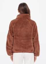THE UPSIDE women's brown Harlow Fleece Pullover features quarter zip, elastic cuffs and waist, and is made from a recycled sherpa fabrication. Made for lifestyle.