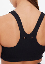 THE UPSIDE women's black recycled jacquard Castilla Jade Bra is a full coverage bra with scooped racerback and features removable cups. Made for yoga & pilates.
