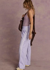 THE UPSIDE women's lilac Juliet Pant features a low-rise with side stripes, an elasticated waist, sideseam pockets and split hem detail. Made for lifestyle.