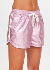 THE UPSIDE women's pink McGrath Billie Run Short is a mid-rise lightweight short in a metallic pink fabrication and features and side pockets and an elasticated waistband with drawcord. Made for lifestyle.