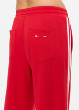 THE UPSIDE women's red When In Roma Holiday Pant is high waisted with an elasticated waistband, made from double faced single jersey fabrication with cream mesh tape along side seams. Made for lifestyle.