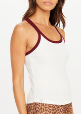 THE UPSIDE women’s cream 100% organic cotton Pipa Rib Tank Top is designed for a true to size fit and features a scoop neckline and racerback silhouette. Made for lifestyle.