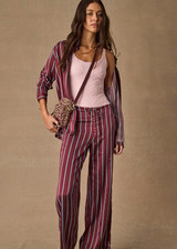 THE UPSIDE women’s stripe 100% silk Capela Charli Drawstring Pant is a low rise straight leg pant and features a soft elastic waistband, side hem splits and drawcord detail. Made for lifestyle.