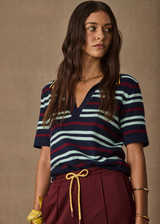 THE UPSIDE women’s stripe 100% organic cotton Archie Collared Knit Polo is true to size and features a striped rib collar, button front closure and ribbed hem. Made for tennis.