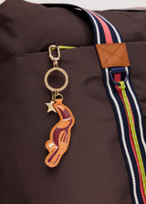 THE UPSIDE women’s yellow Ipanema Keyring is a lifestyle accessory and features a soft toucan charm, gold star detail and embossed logo with metal hardware ring.