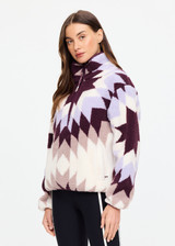 THE UPSIDE women’s recyled Harlow Fleece Pullover is designed for a relaxed fit and features a quarter zip front, zip pockets, elasticated waist and cuffs in our geomteric star jacquard print. Made for lifestyle.