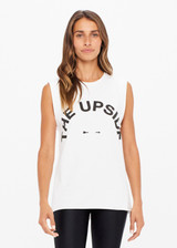THE UPSIDE women's white Muscle Tank is made of organic cotton jersey. It features low-cut arm openings, rolled bind detail at the sleeve and a white horsehoe logo at the centre front.