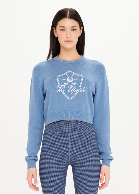 THE UPSIDE The Club Karlie Knit Top in Denim Blue is a sustainable organic cotton knit long sleeve cropped crew with ribbed neckline, hem and cuffs.