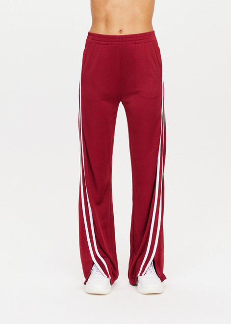 THE UPSIDE women’s merlot-red low-rise Freedom Juliet Pant made with slinky fabrication features contrasting binds, split hem detail, elasticated waist and side seam pockets.