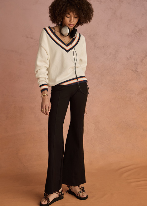 THE UPSIDE women's black classic Joyela Flare Pant is made from a lenzing viscose blend and features an embroidered arrow at the black.