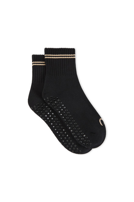 THE UPSIDE women's black Celestia Grip Sock is an anti slip grip sock perfect for pilates & yoga. Featuring a soft terry sole and embroidered lucky horseshoe & star.