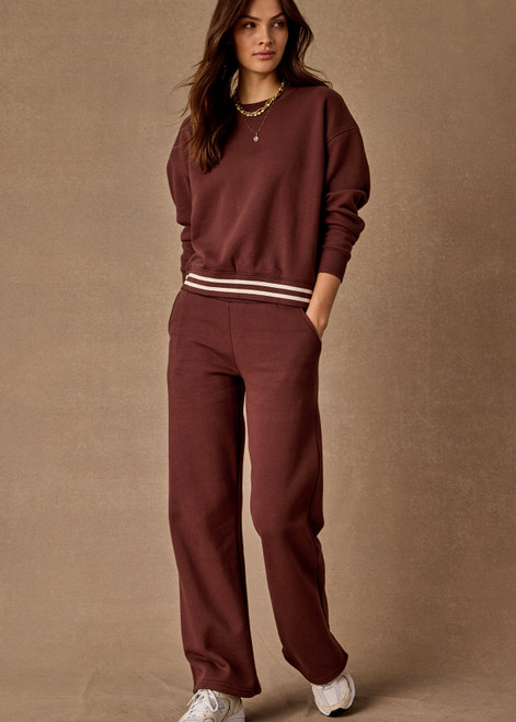 THE UPSIDE women's brown organic cotton Toluca Willow Wide Leg Pant is high-waisted and features a cream striped ribbed waistband and side seam pockets. Made for everyday.