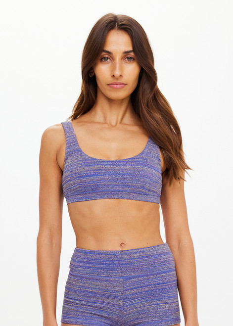THE UPSIDE women's blue jacquard Neptune Scoop Neck Jasmine Bra offers medium coverage with a low scoop neckline with removable cups. Designed for swim.