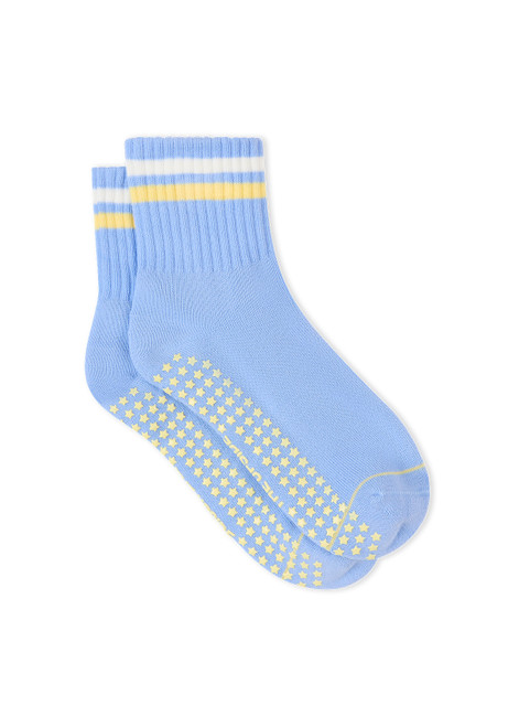 THE UPSIDE women's blue anti-slip Rever Grip Sock features stripes in cream and lemon and a soft terry sole with lemon star grippers. Made for yoga & pilates.
