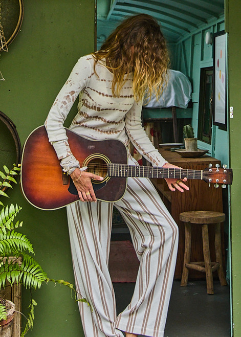 THE UPSIDE women's mocha stripe Baja Charli Drawstring Pant is designed for a low rise, straight leg fit with a elastic waistband with drawcord. Made for lifestyle.