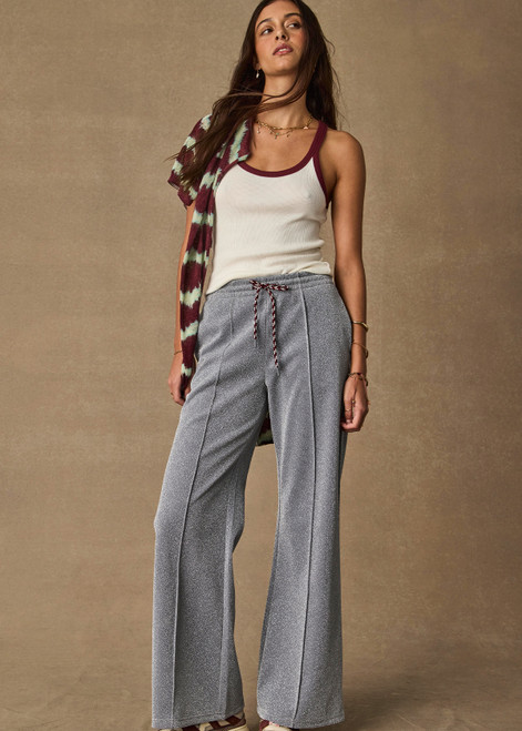 THE UPSIDE women’s sparkle grey Galaxia Marnie Wide Leg Pant is high rise with side pockets, an elasticated waistband and a maroon drawcord. Made for lifestyle.
