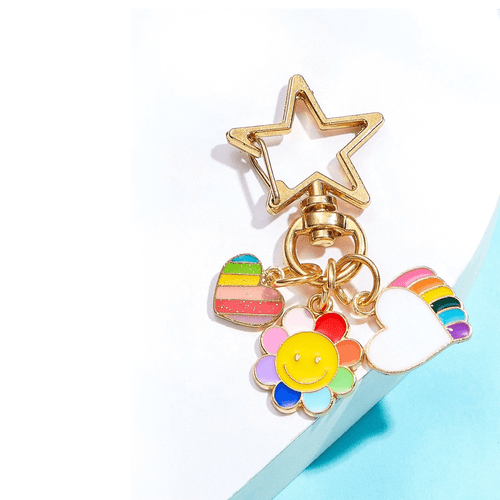Add a touch of vibrant colour and whimsical charm to your everyday accessories with this enchanting and lively Flower Charm Keychain!