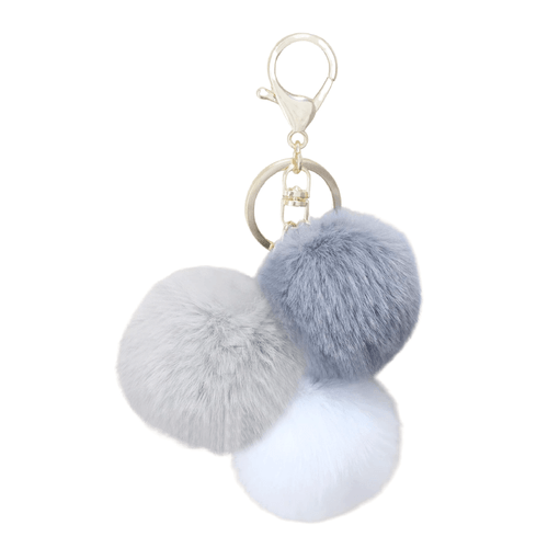 This charming Pom Poms Keychain Grey features a trio of pom poms in shades of dark grey, light grey, and white, adding a whimsical touch to your everyday items.