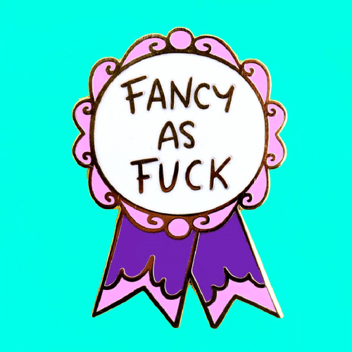 Ah, the pleasure of being unapologetically fancy! Jubly-Umph - Fancy As Fuck Lapel Pin is a bright and bold declaration of your love for all things elegant and luxurious.