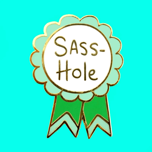 Jubly-Umph - Sass-Hole Lapel Pin is all about attitude, expressing oneself without restraint, and not letting anyone dim your sparkle.