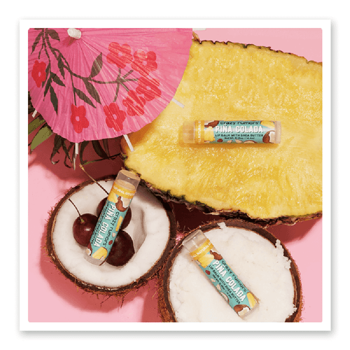 Indulge your senses with the Crazy Rumours Pina Colada Lip Balm, a tropical blend of juicy pineapple and creamy coconut that whisks you away to an island paradise.