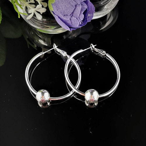 The Emelia Stim Earrings are a harmonious blend of chic sophistication and sensory stimulation and embody the perfect fusion of fashion-forward design and tactile allure.